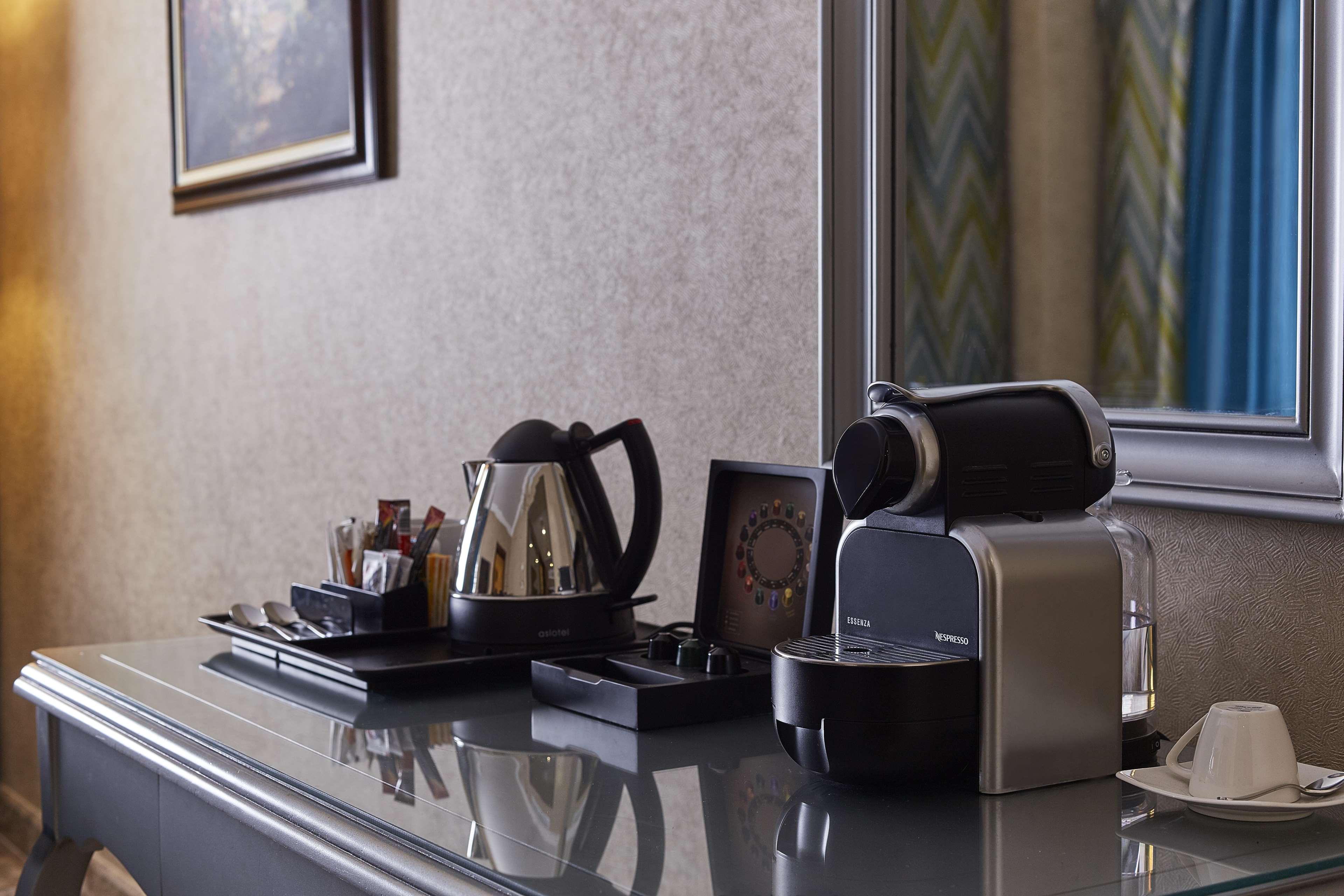 Hotel Hilton Alexandria Corniche Exterior foto A Nespresso machine in a hotel room